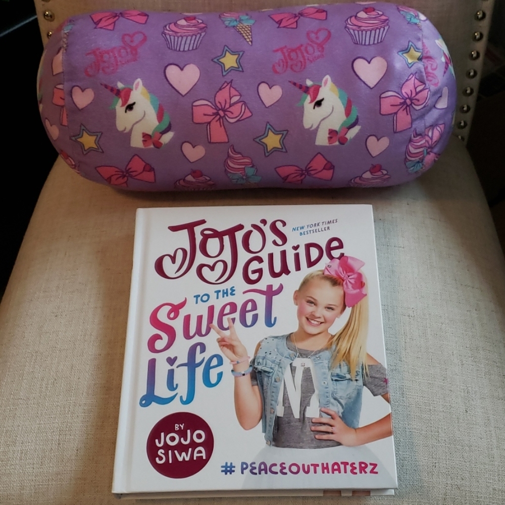 JoJo Swiwaa book and roll pillow